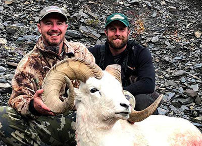 Two hunters with their dall sheep hunt